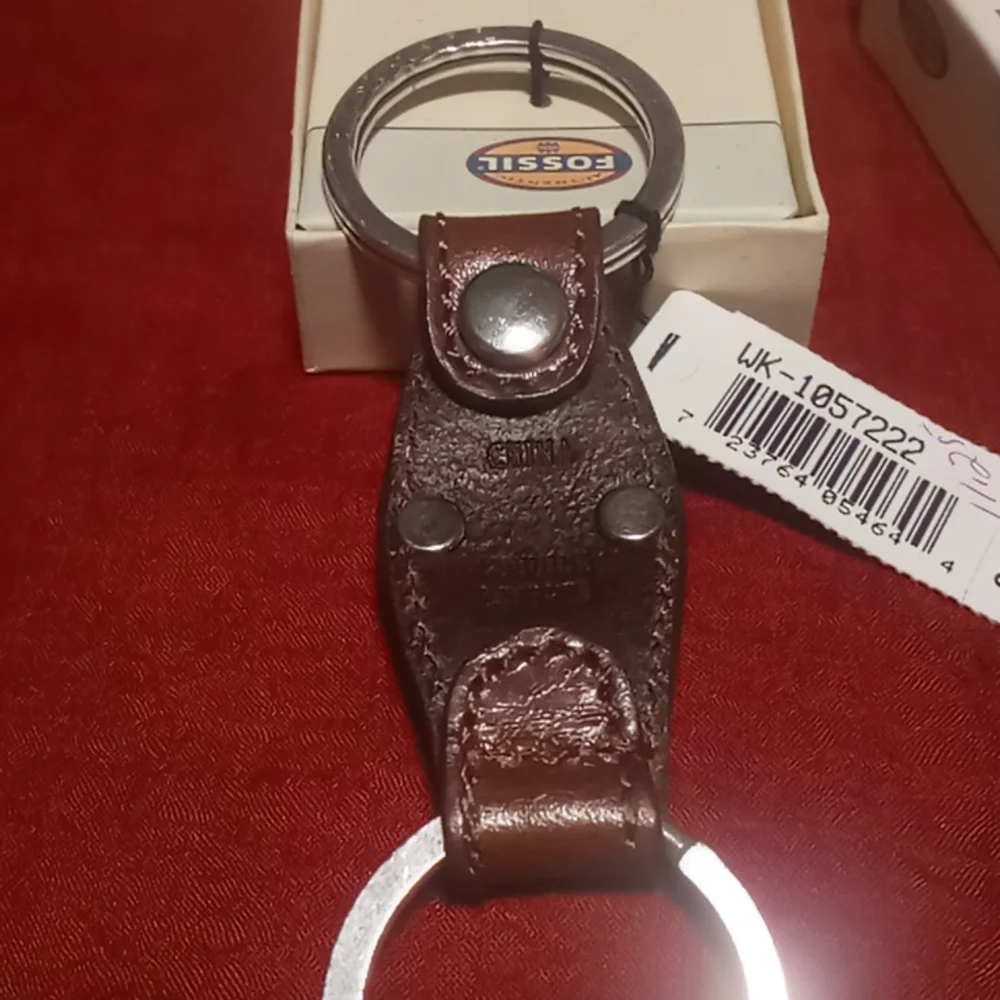 Fossil genuine leather snap key chain.